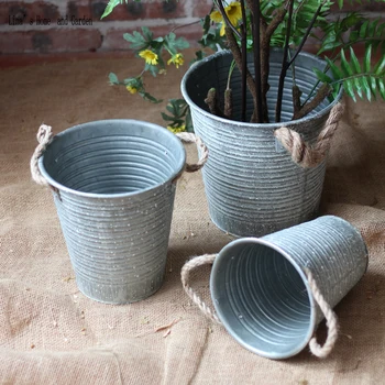 stack 3 pieces vintage antique galvanized bucket planters with hemp rope handles
stack 3 pieces vintage antique galvanized bucket planters with hemp rope handles