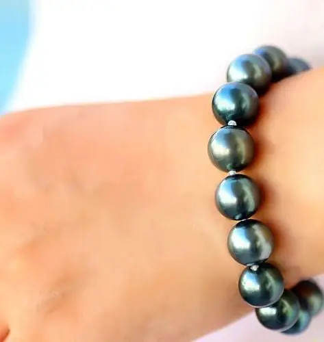 Free shipping@@@@@ Charming 7.5-8"11-12mm natutal tahitian genuine black round pearl bracelet
Free shipping@@@@@ Charming 7.5-8"11-12mm natutal tahitian genuine black round pearl bracelet