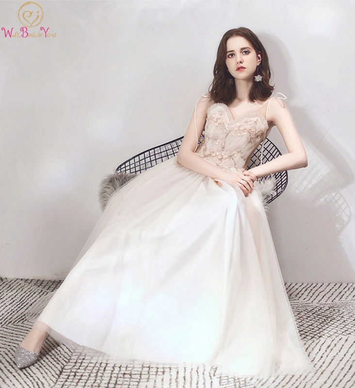 Champagne Prom Dress 2019 Spaghetti Straps A-line Lace-up Transparent Sides Backless V-neck Floor Length Appliques Evening Gown
Champagne Prom Dress 2019 Spaghetti Straps A-line Lace-up Transparent Sides Backless V-neck Floor Length Appliques Evening Gown