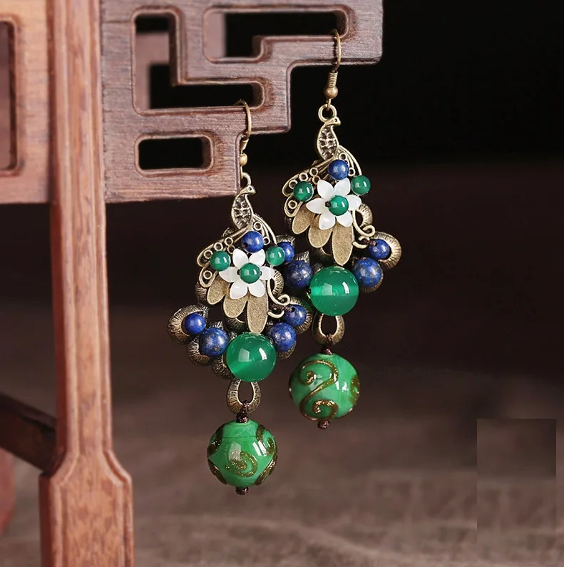 S925 Sterlijng Silver Original Green Peacock Glass Agate Shell Accessories National Wind Earring Restoration Wind ear pendant
S925 Sterlijng Silver Original Green Peacock Glass Agate Shell Accessories National Wind Earring Restoration Wind ear pendant