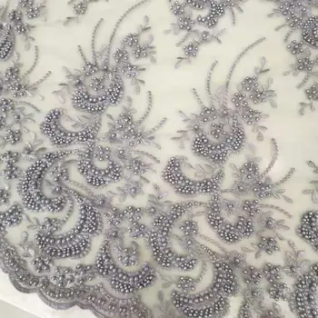 High quality heavy craft beaded Nigeria lace decal French mesh fabric African lace can design wedding evening dress DIY clothing
High quality heavy craft beaded Nigeria lace decal French mesh fabric African lace can design wedding evening dress DIY clothing