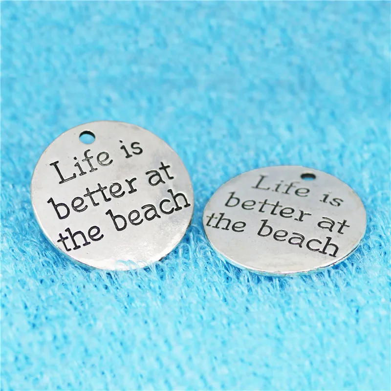 Top Quality 10 Pcs/lot Diameter 23mm Life is better at the beach Antique Silver Round Disc Quote Message Charms Pendant
Top Quality 10 Pcs/lot Diameter 23mm Life is better at the beach Antique Silver Round Disc Quote Message Charms Pendant