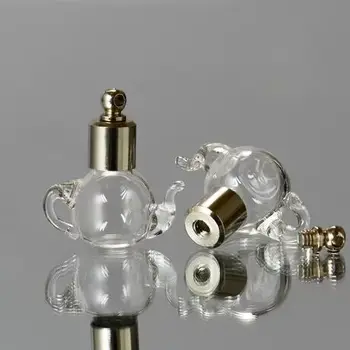50pcs teapot shape SCREW CAP clear Glass Vial Pendant name on rice art Mini perfume oil wishing bottle craft necklace decor gift
50pcs teapot shape SCREW CAP clear Glass Vial Pendant name on rice art Mini perfume oil wishing bottle craft necklace decor gift