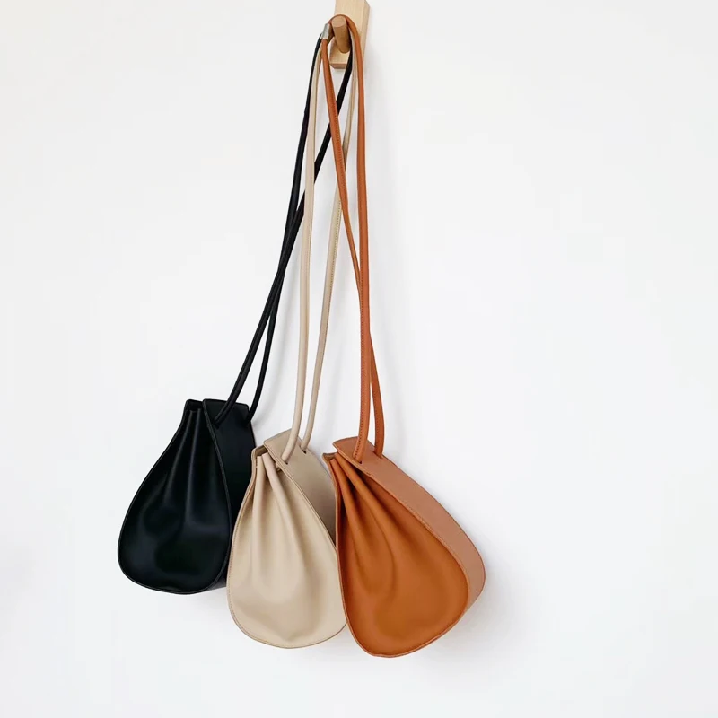 2019 New PU Leather Small Ladies Handbag Women Crossbody Shoulder Bag Fashion Drawsting Bucket Bag Chic Dumplings Bag Whole Sale
2019 New PU Leather Small Ladies Handbag Women Crossbody Shoulder Bag Fashion Drawsting Bucket Bag Chic Dumplings Bag Whole Sale