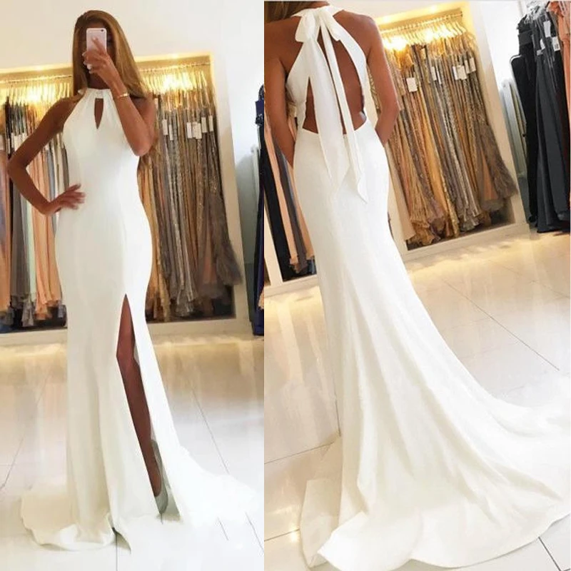 Prom Gowns Custom Made White Halter Evening Gowns Side Slit Sleeveless Simple Open-Back Mermaid Long Formal Party Dresses
Prom Gowns Custom Made White Halter Evening Gowns Side Slit Sleeveless Simple Open-Back Mermaid Long Formal Party Dresses