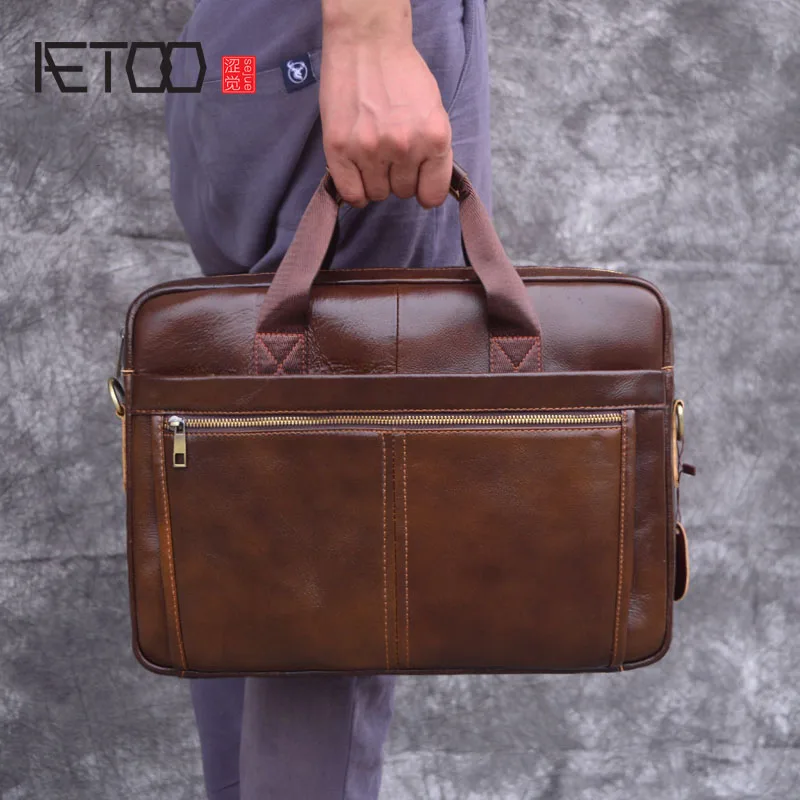 AETOO Men's leather briefcase retro large capacity computer bag top layer leather travel portable Messenger bag
AETOO Men's leather briefcase retro large capacity computer bag top layer leather travel portable Messenger bag