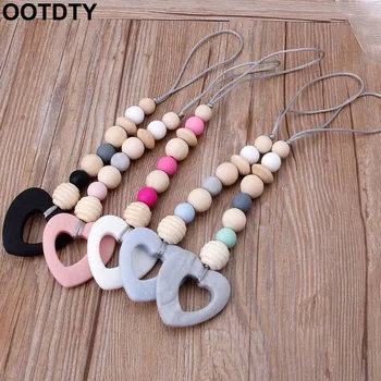 Baby Teether Play Gym Toy Safe Silicone & Wood Babe Hanger Toys Toddler Teething Rattle Nursery Toy Newborn Gift
Baby Teether Play Gym Toy Safe Silicone & Wood Babe Hanger Toys Toddler Teething Rattle Nursery Toy Newborn Gift