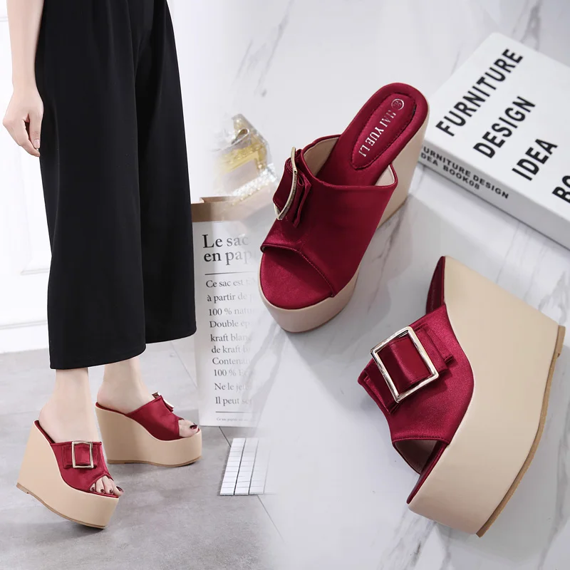 Summer new thick-bottomed slope with high-heeled square-shaped buckle slippers super high heel comfortable sandals.
Summer new thick-bottomed slope with high-heeled square-shaped buckle slippers super high heel comfortable sandals.