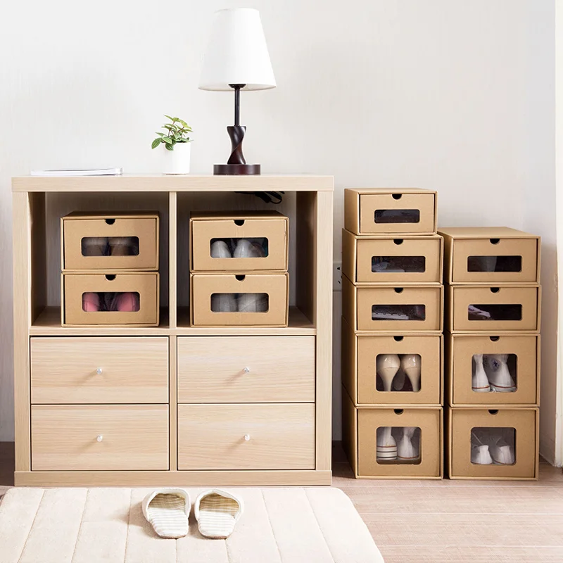 Multifunction kraft paper drawer type shoe storage box with window transparent foldable home sundries box hot sale.
Multifunction kraft paper drawer type shoe storage box with window transparent foldable home sundries box hot sale.