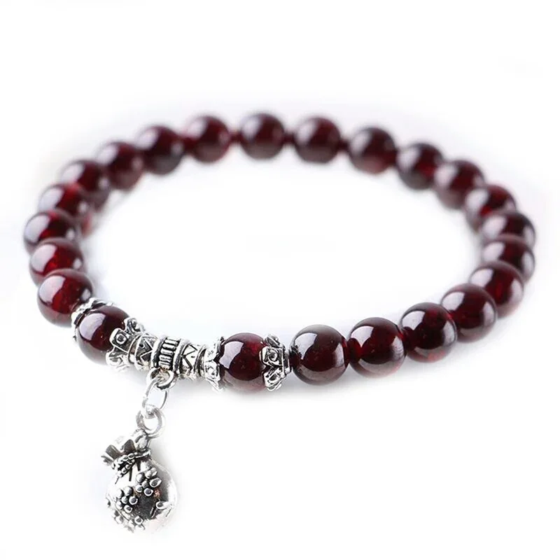 Wholesale Red Wine Garnet Natural Stone Bracelets Tibetan Silver Money Bag Pendant Bracelets for Women Simple Crystal Jewelry
Wholesale Red Wine Garnet Natural Stone Bracelets Tibetan Silver Money Bag Pendant Bracelets for Women Simple Crystal Jewelry