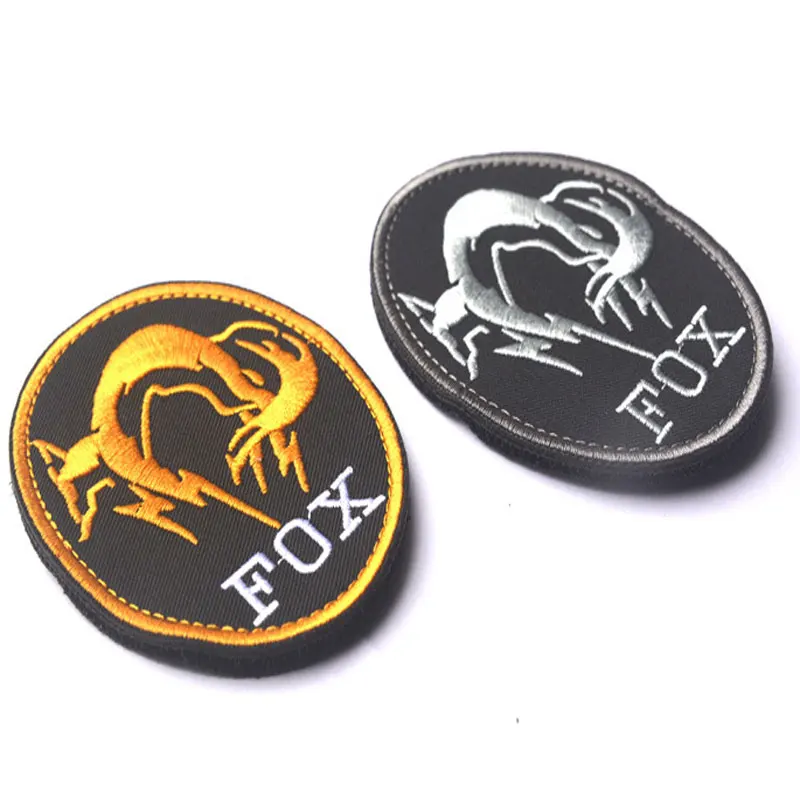 Black Metal Equipment FOX Foxhound Special Forces Group Embroidery Patch Badge Armband Clothing Decoration Yellow, Silver Gray
Black Metal Equipment FOX Foxhound Special Forces Group Embroidery Patch Badge Armband Clothing Decoration Yellow, Silver Gray