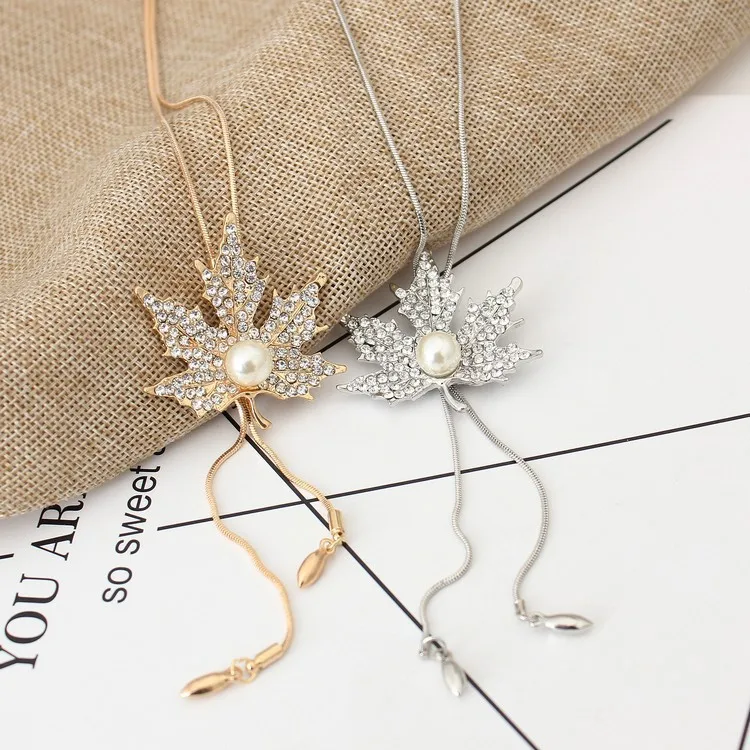 The New 2018 Lovely Maple Leaf Long Beaded Chain Tassel Pendant Necklace Women Office Lady Imitation Pearl Jewelry Bijoux Gifts
The New 2018 Lovely Maple Leaf Long Beaded Chain Tassel Pendant Necklace Women Office Lady Imitation Pearl Jewelry Bijoux Gifts