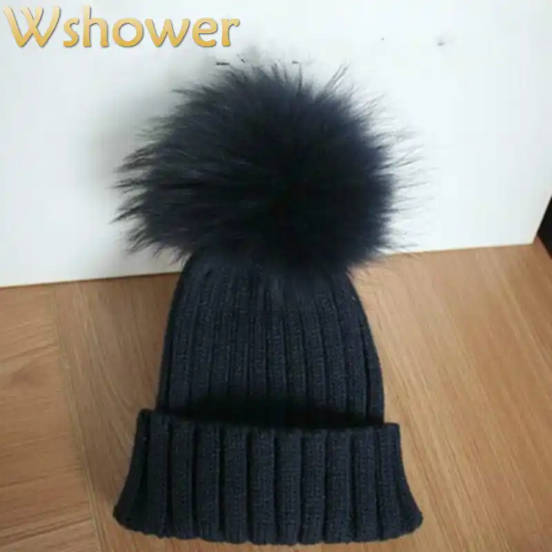 snow hat with ball on top