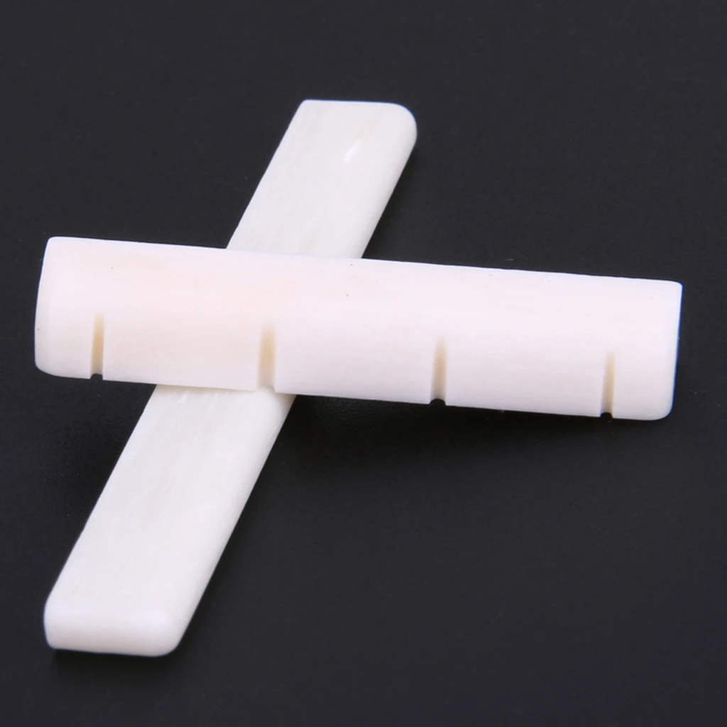 35mm Nut and 53mm Saddle Nut And Saddle Set For Ukulele Guitar Parts String Instrument Accessory
35mm Nut and 53mm Saddle Nut And Saddle Set For Ukulele Guitar Parts String Instrument Accessory