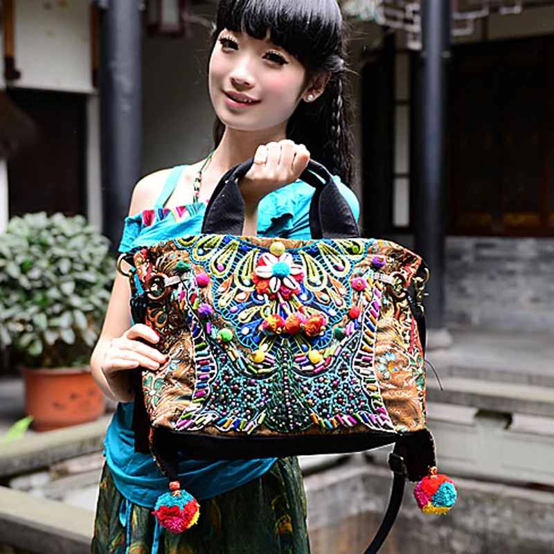 Bohemia exotic embroidery canvas tassel handbags Original Folk style handmade beaded pompon Shoulder Messenger Bags
Bohemia exotic embroidery canvas tassel handbags Original Folk style handmade beaded pompon Shoulder Messenger Bags