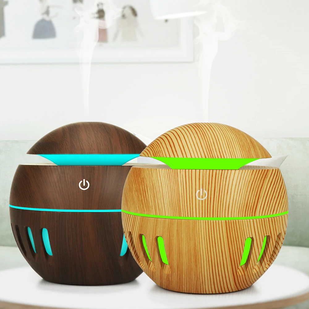 New Design 130ML Small Portable Air Humidifier for Small Space Room Desktop Mini Cute Humidifier Color Lights Wood Grain
New Design 130ML Small Portable Air Humidifier for Small Space Room Desktop Mini Cute Humidifier Color Lights Wood Grain