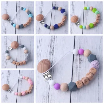 New Wooden Baby Pacifier Clip 7 Color Pacifier Chain For Baby Teething Holder Soother Chew Toy Dummy Clips
New Wooden Baby Pacifier Clip 7 Color Pacifier Chain For Baby Teething Holder Soother Chew Toy Dummy Clips