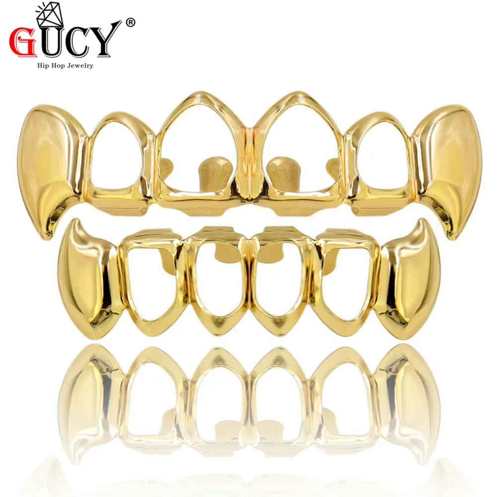 GUCY Custom Fit Pure Gold Color Plated Vampire Teeth Four Hollow Open Face Gold Mouth GRILLZ Caps Top&Bottom Hip Hop Grill Set
GUCY Custom Fit Pure Gold Color Plated Vampire Teeth Four Hollow Open Face Gold Mouth GRILLZ Caps Top&Bottom Hip Hop Grill Set