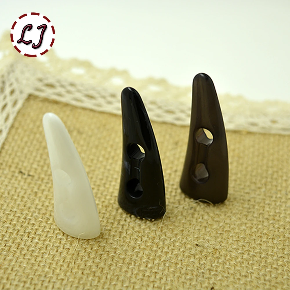 2015 New high quality 10pcs/lot black white coffee 41mm*16mm horn button DIY Accessory Sewing
2015 New high quality 10pcs/lot black white coffee 41mm*16mm horn button DIY Accessory Sewing
