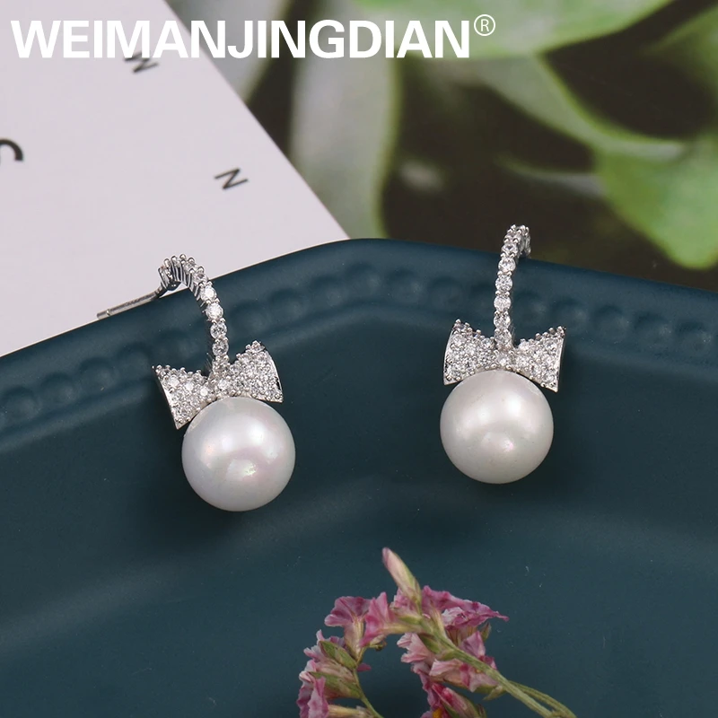 WEIMANJINGDIAN Bow with Shell Pearl Cubic Zirconia Dangle & Chandelier Earrings for Women in Silver / Gold Color
WEIMANJINGDIAN Bow with Shell Pearl Cubic Zirconia Dangle & Chandelier Earrings for Women in Silver / Gold Color
