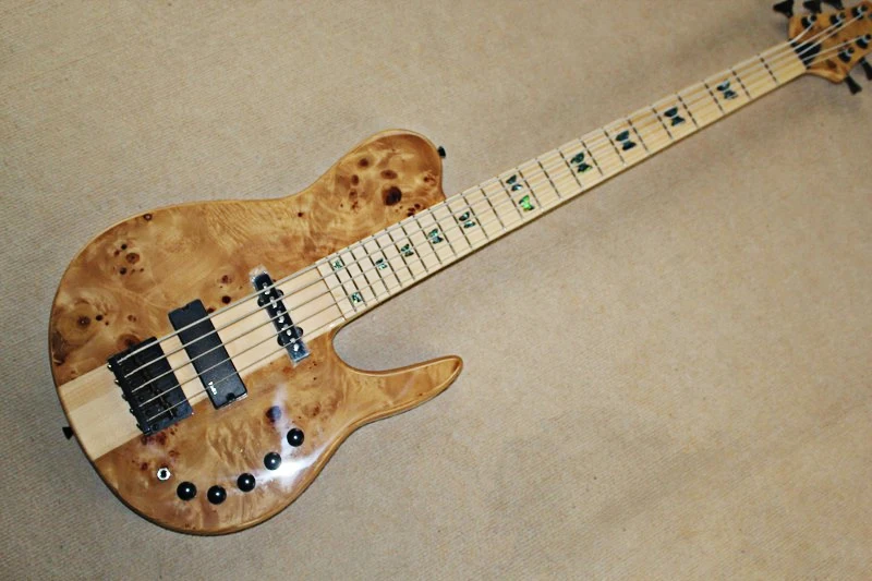 Factory custom 5 strings neck-thru-body electric bass guitar with tree-burl veneerBlack hardwares,Butterfly inlay
Factory custom 5 strings neck-thru-body electric bass guitar with tree-burl veneerBlack hardwares,Butterfly inlay