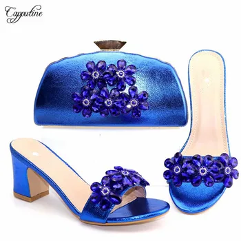 Fashionbale royal blue shoes and evening bag sets decorated with crystal stones 56896-1, heel height 7.5cm
Fashionbale royal blue shoes and evening bag sets decorated with crystal stones 56896-1, heel height 7.5cm