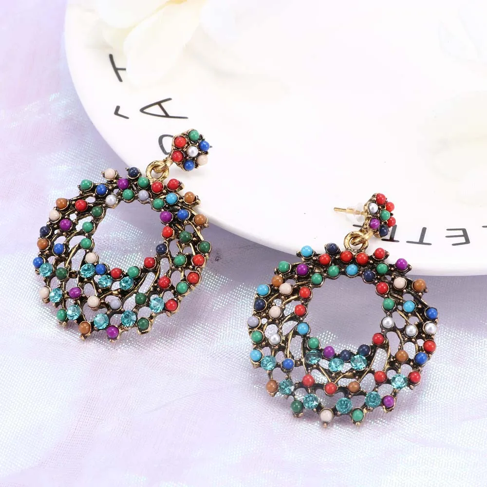 1Pair Ethnic Bohemian Earrings Vintage Style Color Beads Hollow Round Drop Earrings Wedding Bridal Fringed Gift Party Jewelry
1Pair Ethnic Bohemian Earrings Vintage Style Color Beads Hollow Round Drop Earrings Wedding Bridal Fringed Gift Party Jewelry