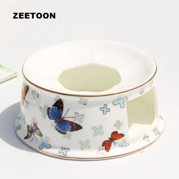 American Style Candle Warmer Warm Tea Stove Ceramic Bone China Candlestick Butterfly Pattern Base for Teapot Accessories Heater
American Style Candle Warmer Warm Tea Stove Ceramic Bone China Candlestick Butterfly Pattern Base for Teapot Accessories Heater
