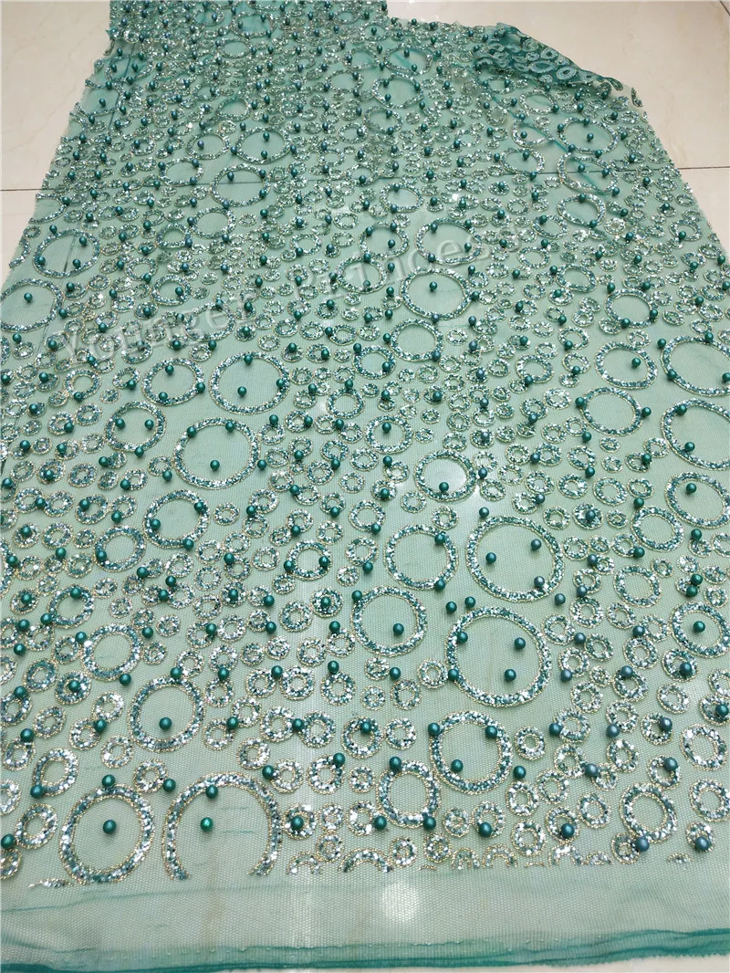Romantic YG-04 glued glitter tulle fabric with beads in green color for fashion dress (5yard/lot)
Romantic YG-04 glued glitter tulle fabric with beads in green color for fashion dress (5yard/lot)
