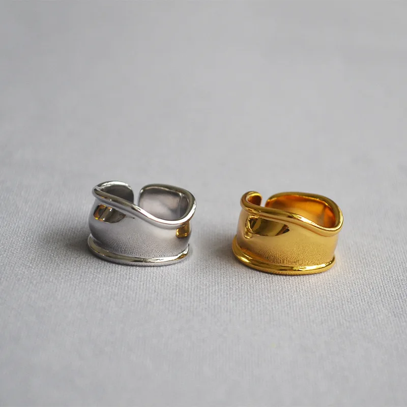 European and American original cold wind irregular smooth brass opening adjustable wide-plate ring index finger ring
European and American original cold wind irregular smooth brass opening adjustable wide-plate ring index finger ring