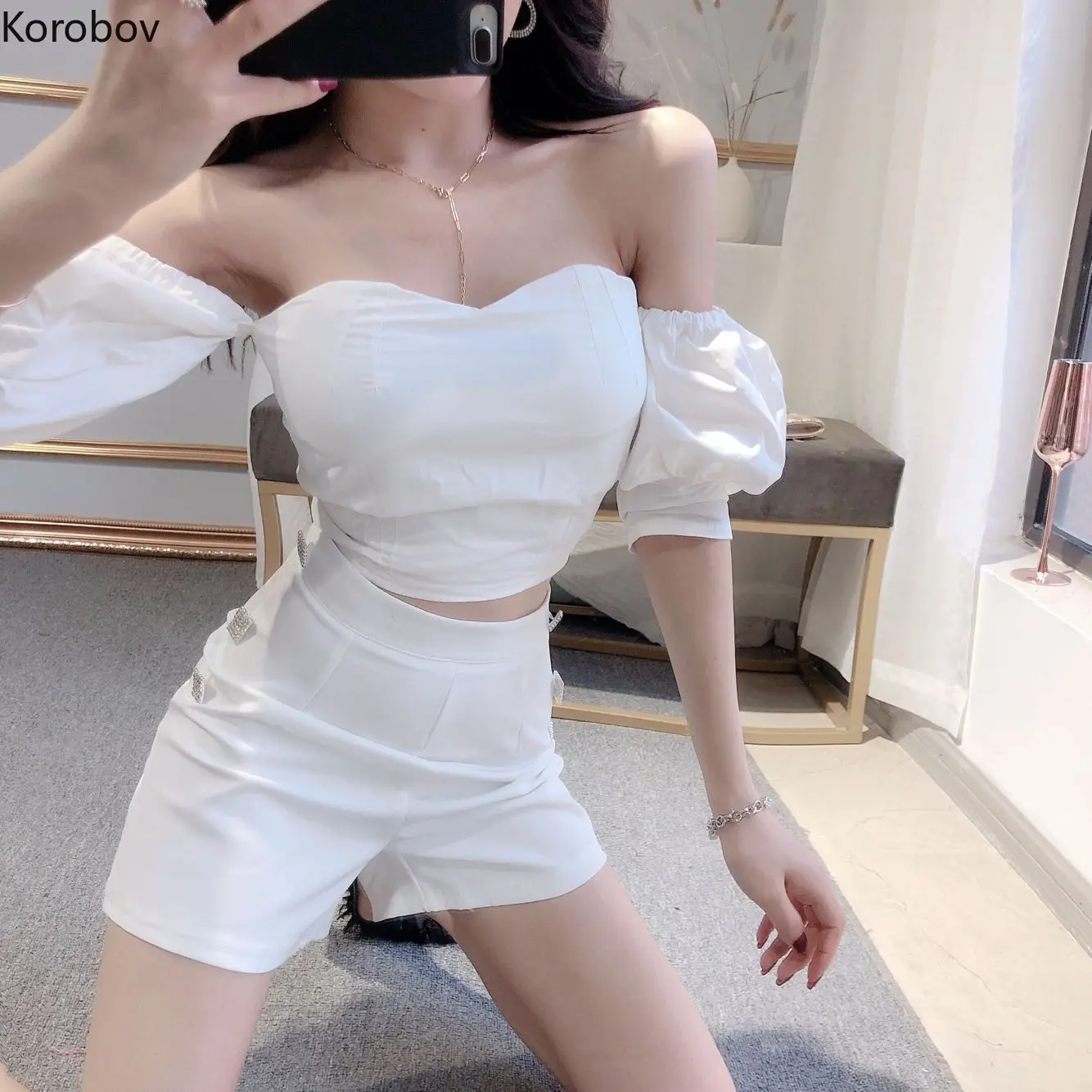 Korobov Sexy Slash Neck Puff Sleeve Crop Top and Mini Solid Skirts Suits Korean Slim Two Piece Set Women Suit 77708
Korobov Sexy Slash Neck Puff Sleeve Crop Top and Mini Solid Skirts Suits Korean Slim Two Piece Set Women Suit 77708