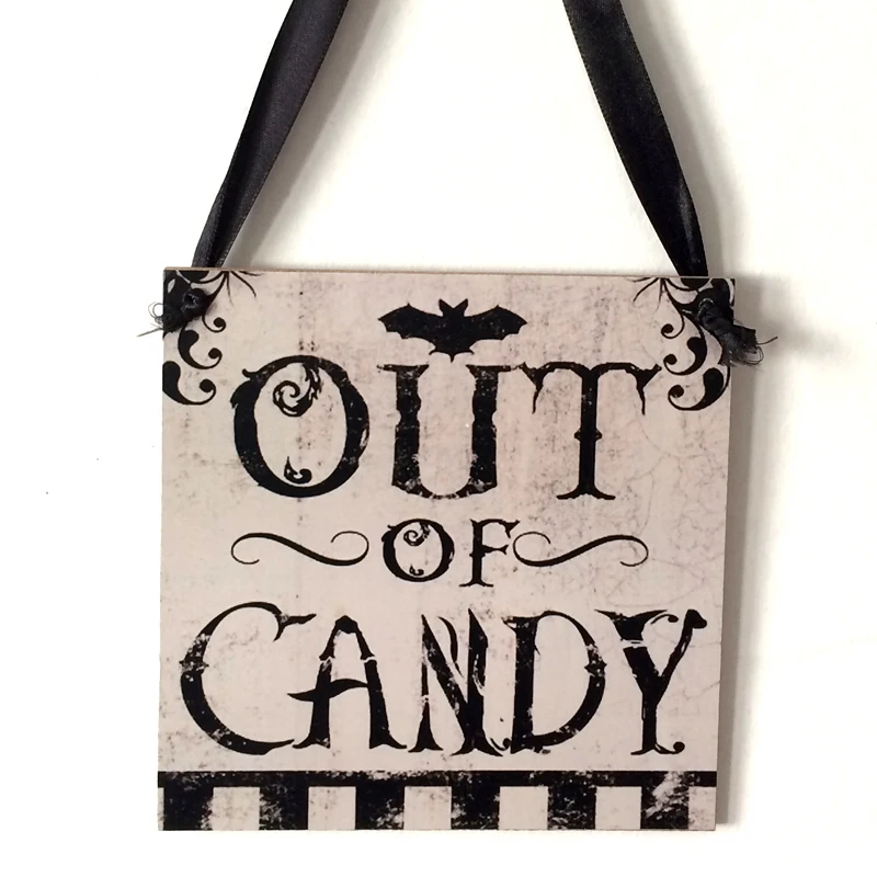 Fly away to the dark side of Halloween décor with this enchanting "The Witch Is In" rustic wooden plaque! This quirky decoration is sure to spark conversations and cast a spell over trick-or-treaters. Come, come! The Witch Is In!  On the back side it says "Out of Candy".