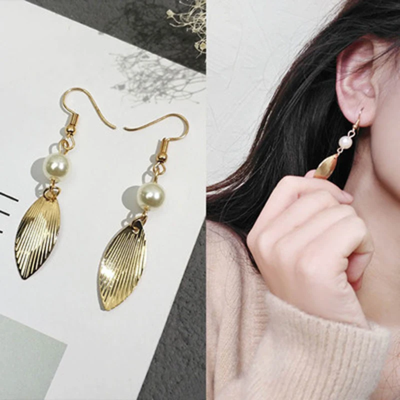 

SUKI Korean fashion earrings wholesale jewelry long earrings female earrings simple Sen Department of metal leaves earrings