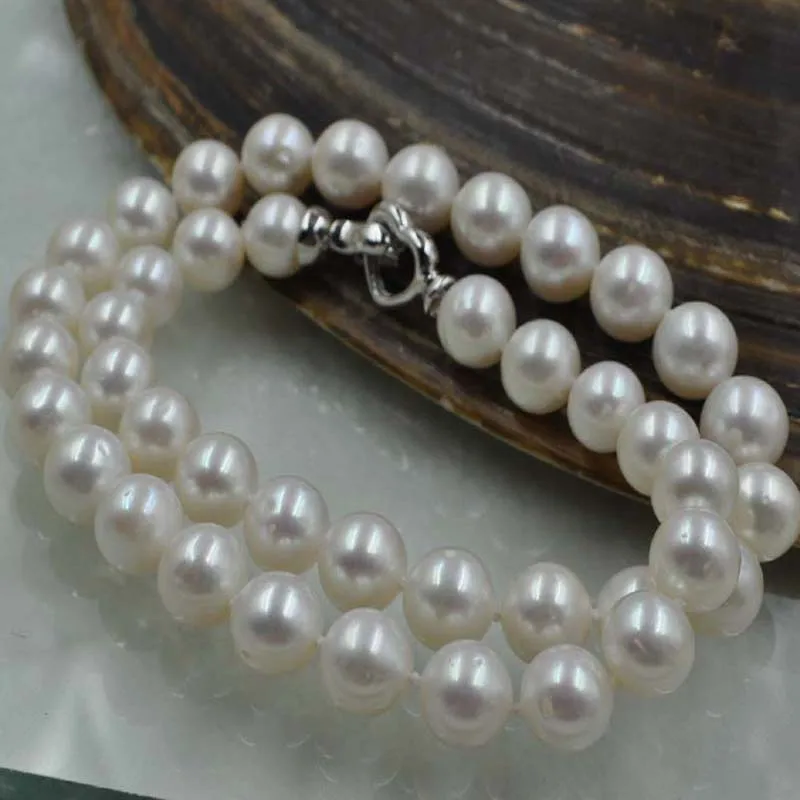 45cm 9.5-10mm round white freshwater pearl necklace Free shipping
45cm 9.5-10mm round white freshwater pearl necklace Free shipping