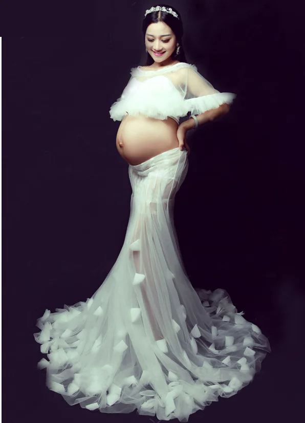 The new Korean maternity clothing fashion photo studio photo photography veil mother pregnant women tail shape
The new Korean maternity clothing fashion photo studio photo photography veil mother pregnant women tail shape