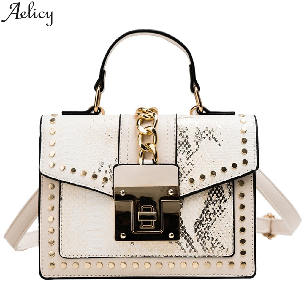 Aelicy Fashion Lady Serpentine Rivet Messenger Bag Retro Banquet Shoulder Bag Business Handbag Bolso Serpentina De Remache 
Aelicy Fashion Lady Serpentine Rivet Messenger Bag Retro Banquet Shoulder Bag Business Handbag Bolso Serpentina De Remache