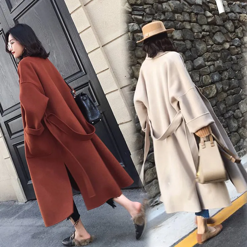 Autumn winter woolen coat women Loose Large size wool coats female Belt slim long Basic coats Both sides of the slit jacket N332
Autumn winter woolen coat women Loose Large size wool coats female Belt slim long Basic coats Both sides of the slit jacket N332
