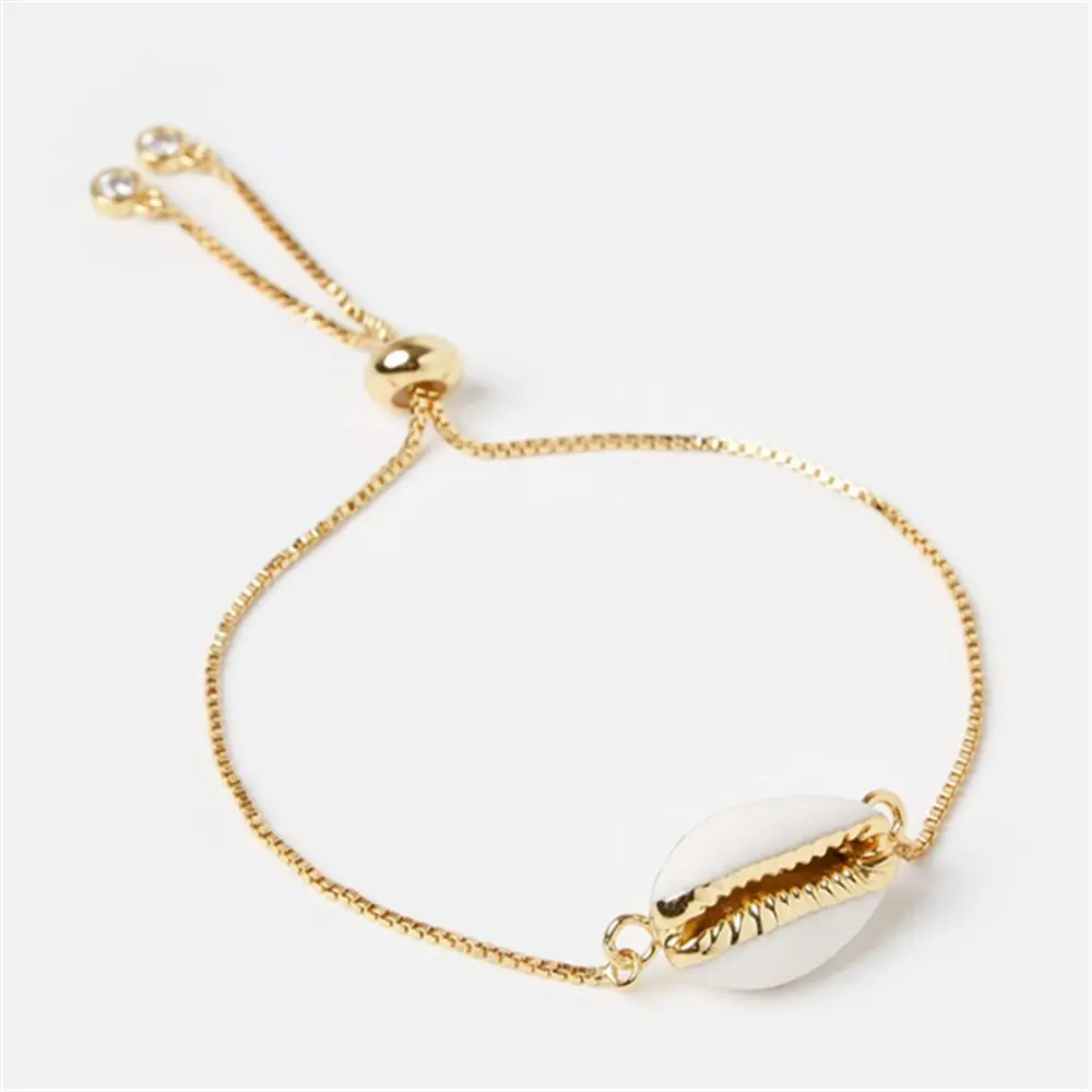 Bohemian Natural Shell-Wrapped Chain Bracelet for Women Natural Cowrie Shell Pendant With Double Bails Gold Trim Chain Bangle
Bohemian Natural Shell-Wrapped Chain Bracelet for Women Natural Cowrie Shell Pendant With Double Bails Gold Trim Chain Bangle