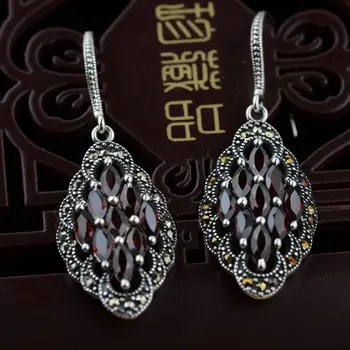 Thai silver earrings S925 silver inlaid red Zircon Earrings antique craft female classic personality styles
Thai silver earrings S925 silver inlaid red Zircon Earrings antique craft female classic personality styles