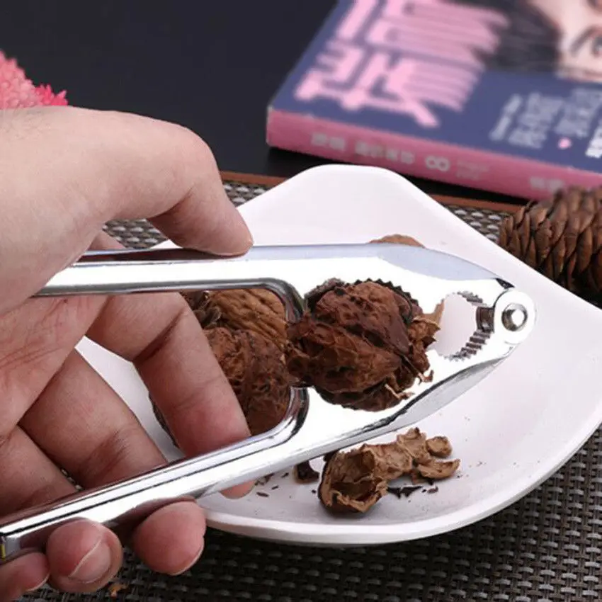 Mini Stainless Nutcracker Sheller Walnut Nut Cracker Quick Walnut Almond Pecan Nutcracker Kitchen Fruit Tool Accessories
Mini Stainless Nutcracker Sheller Walnut Nut Cracker Quick Walnut Almond Pecan Nutcracker Kitchen Fruit Tool Accessories