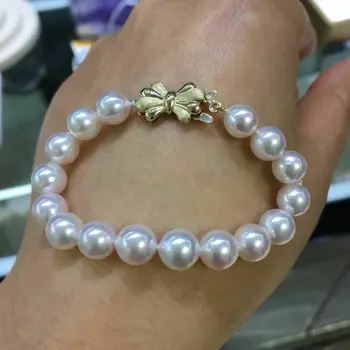 gorgeous 10-11mm south sea white pearl bracelet 7.5-8"14k 
gorgeous 10-11mm south sea white pearl bracelet 7.5-8"14k