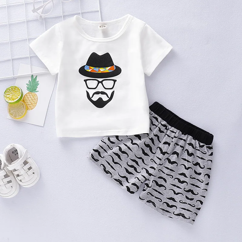 Summer Toddler boys shirts Kids Girls Cotton Short Sleeve Mustache Cartoon Printing T-shirt Short Pants Clothes Outfits Set D20
Summer Toddler boys shirts Kids Girls Cotton Short Sleeve Mustache Cartoon Printing T-shirt Short Pants Clothes Outfits Set D20