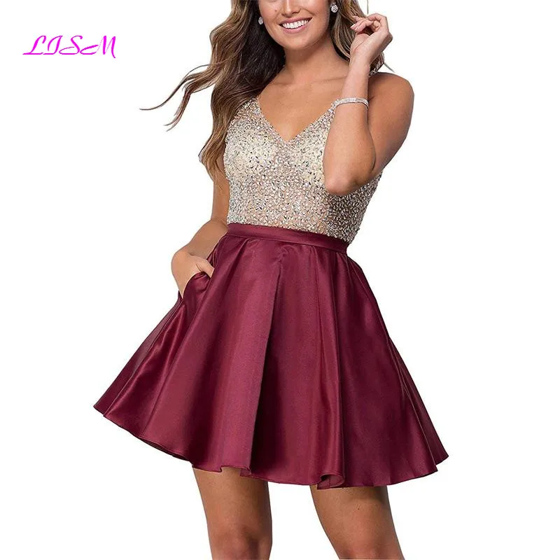 2019 New Arrival Sequins Sheer Bodice V-Neck Mini Homecoming Dresses Short Satin Short Prom Party Gowns with Pockets
2019 New Arrival Sequins Sheer Bodice V-Neck Mini Homecoming Dresses Short Satin Short Prom Party Gowns with Pockets