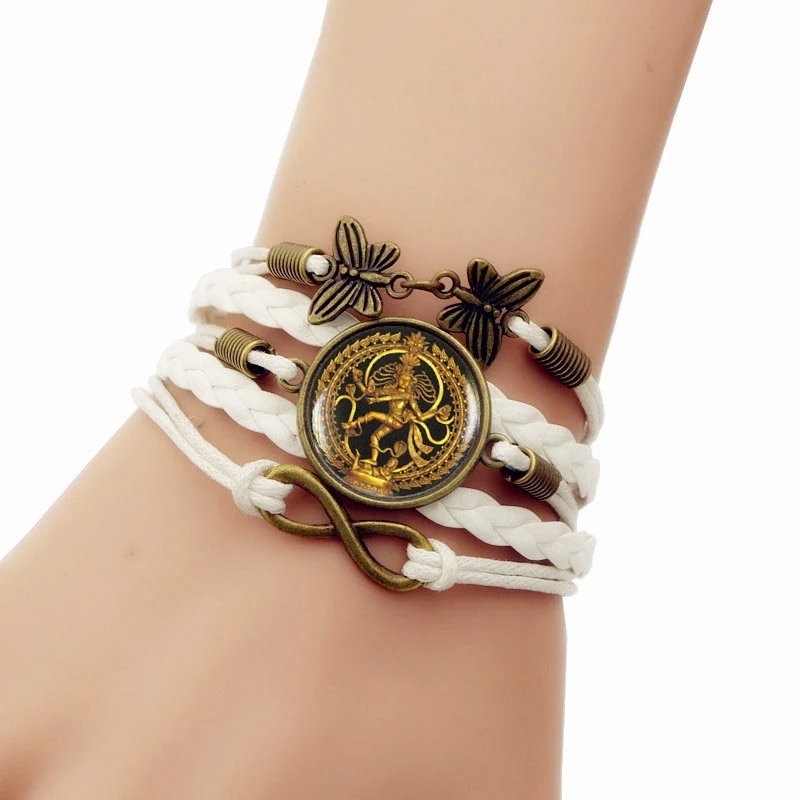 Handmade Knitted Leather bracelet Statue of Dancing Shiva Vintage Jewelry Multilayer Glass convex combinatios
Handmade Knitted Leather bracelet Statue of Dancing Shiva Vintage Jewelry Multilayer Glass convex combinatios