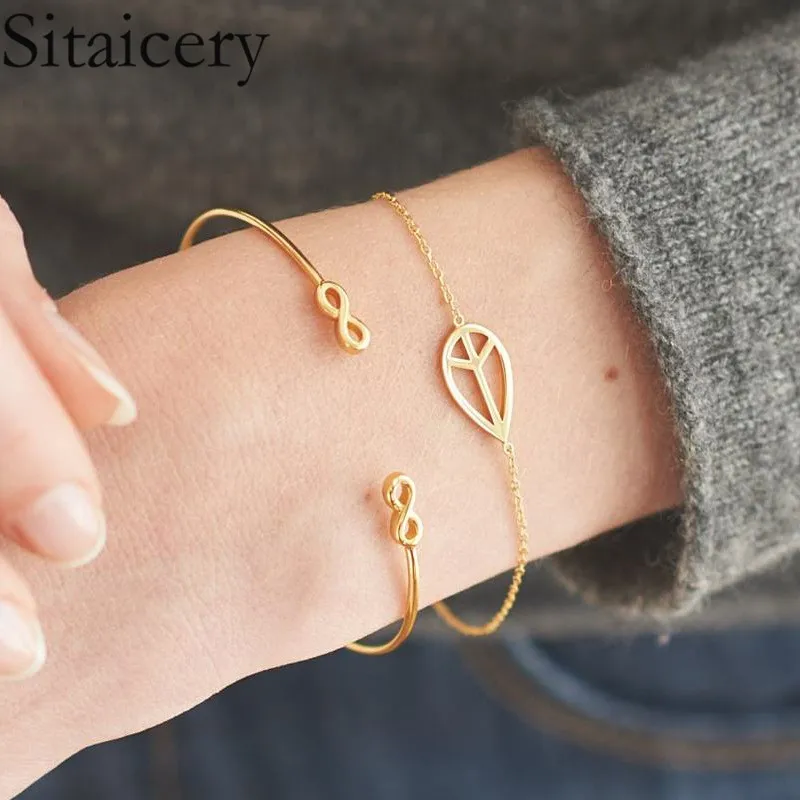 Sitaicery 2pcs/set New Korean Hot Fashion Simple Metal 8 Infinity Charm Bracelets For Women & Men Jewelry Summer Style Beach
Sitaicery 2pcs/set New Korean Hot Fashion Simple Metal 8 Infinity Charm Bracelets For Women & Men Jewelry Summer Style Beach
