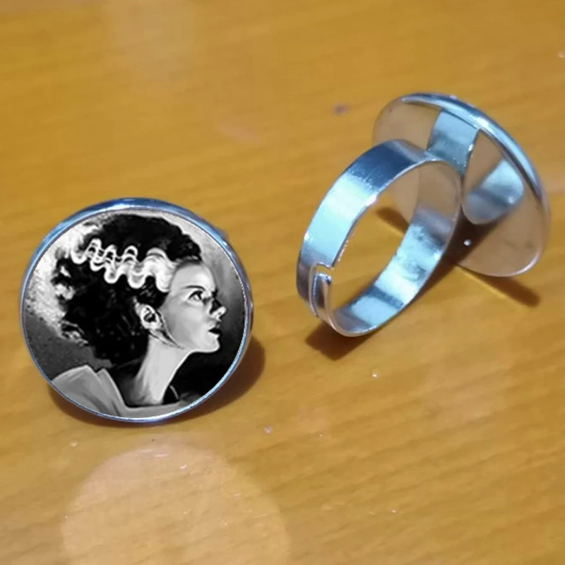 Traditional Frankenstein and his bride ring handmade glass dome bride's Frankenstein ring
Traditional Frankenstein and his bride ring handmade glass dome bride's Frankenstein ring