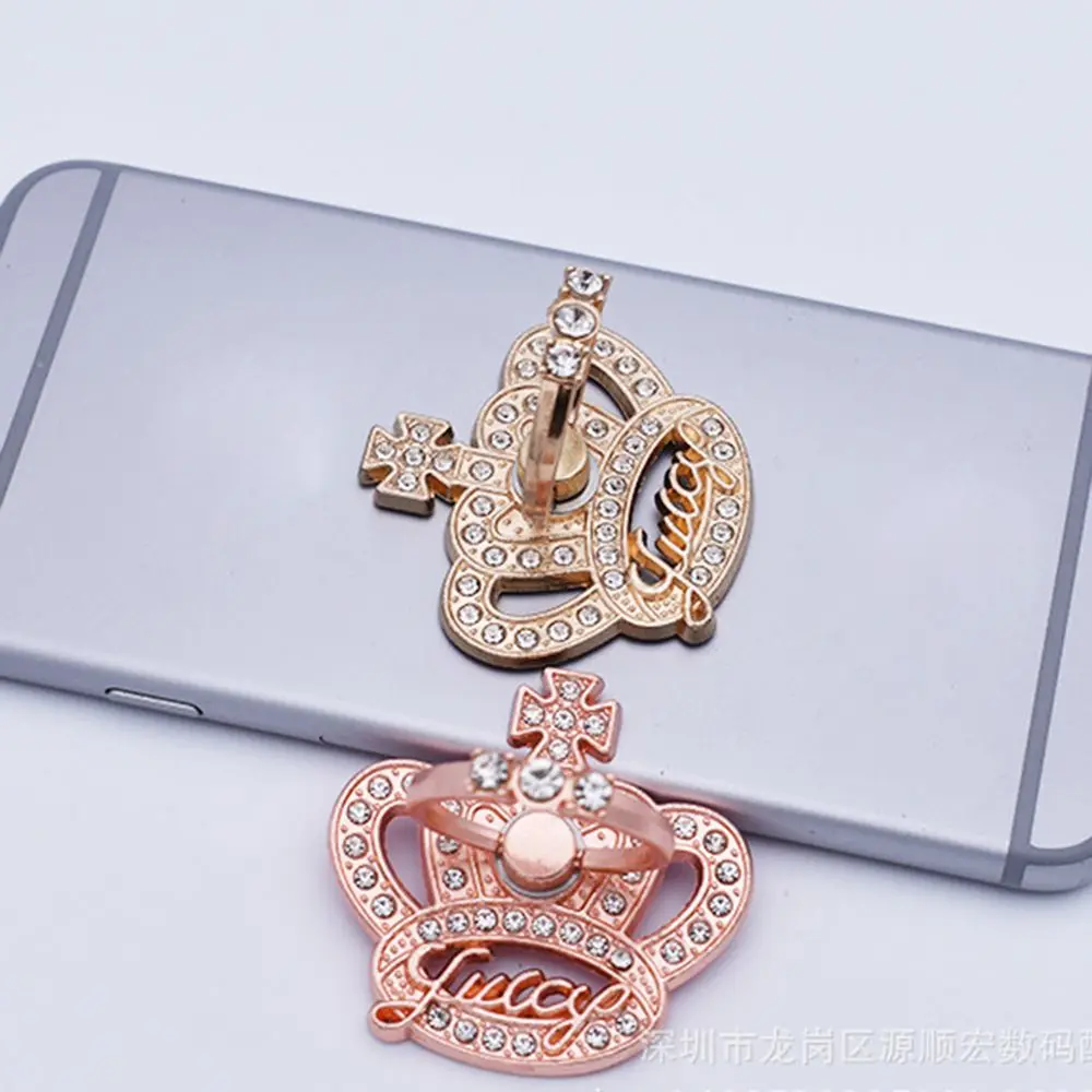 Crown Universal Bracket 360 Rotation Finger Ring Phone Stand Car Mount Anti-Slip Mat
Crown Universal Bracket 360 Rotation Finger Ring Phone Stand Car Mount Anti-Slip Mat