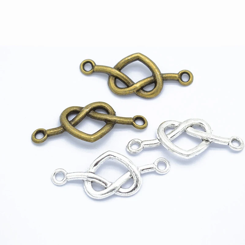 20pcs/lot Tibetan Antique Silver Knot Heart Charms Connectors 33x13mm Love Heart Pendant for DIY Jewelry Making Craft Supplier
20pcs/lot Tibetan Antique Silver Knot Heart Charms Connectors 33x13mm Love Heart Pendant for DIY Jewelry Making Craft Supplier