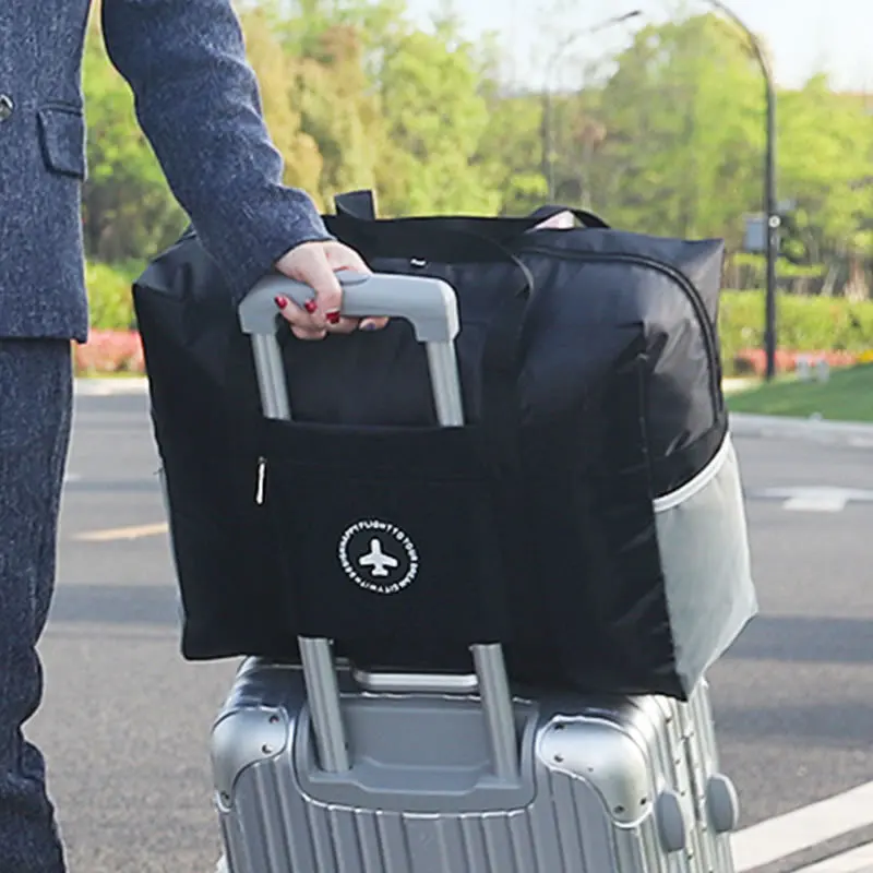 Travel pocket waterproof bag bag portable can pull rod box suit portable receive package
Travel pocket waterproof bag bag portable can pull rod box suit portable receive package