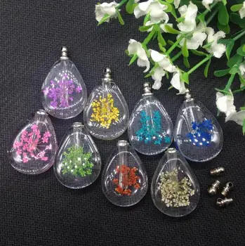 50pieces 20*28mm Real natural dried flower vial pendant screw cap Creative charm perfume oil bottle pendant name on rice jewelry
50pieces 20*28mm Real natural dried flower vial pendant screw cap Creative charm perfume oil bottle pendant name on rice jewelry
